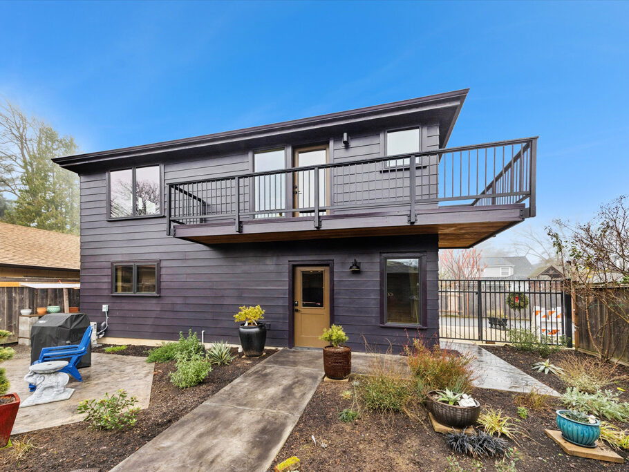 Exterior of 2nd story ADU with garage underneath, contemporary styling