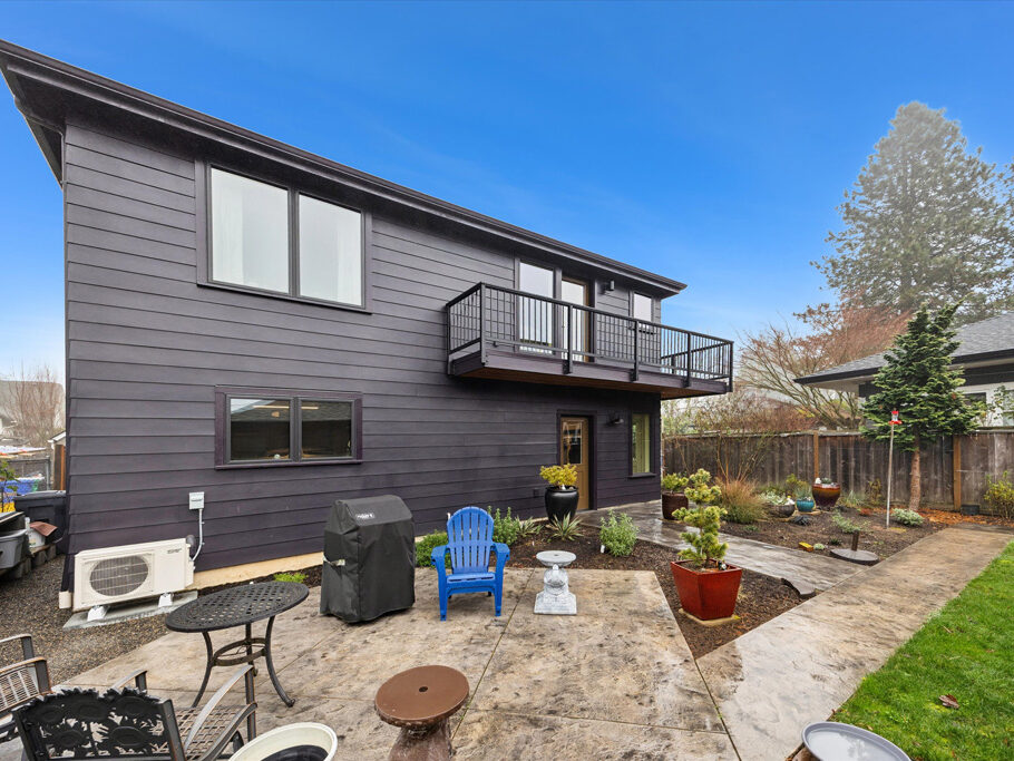Exterior of 2nd story ADU with garage underneath, contemporary styling