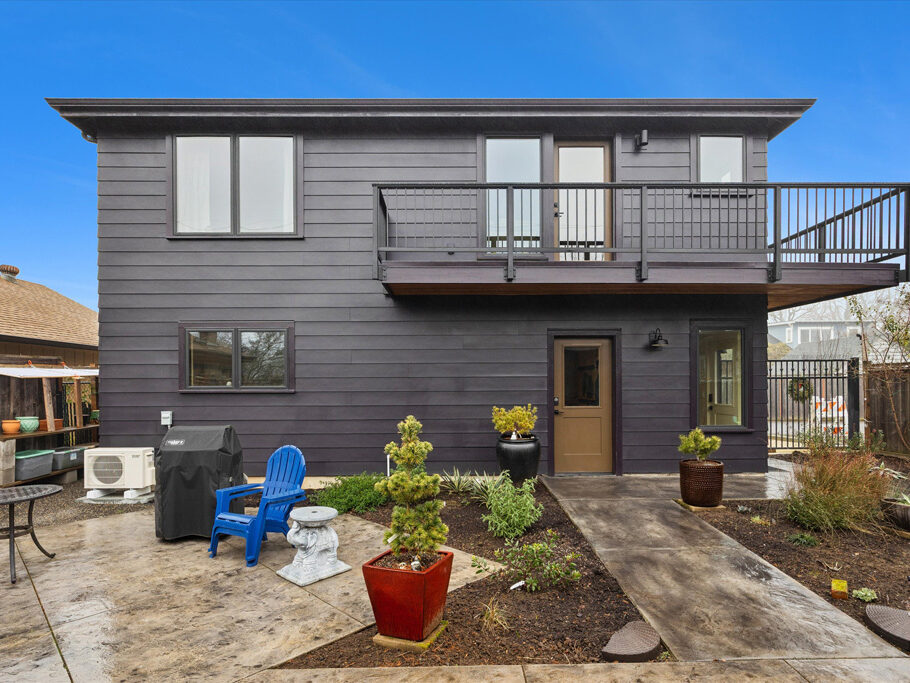 Exterior of 2nd story ADU with garage underneath, contemporary styling