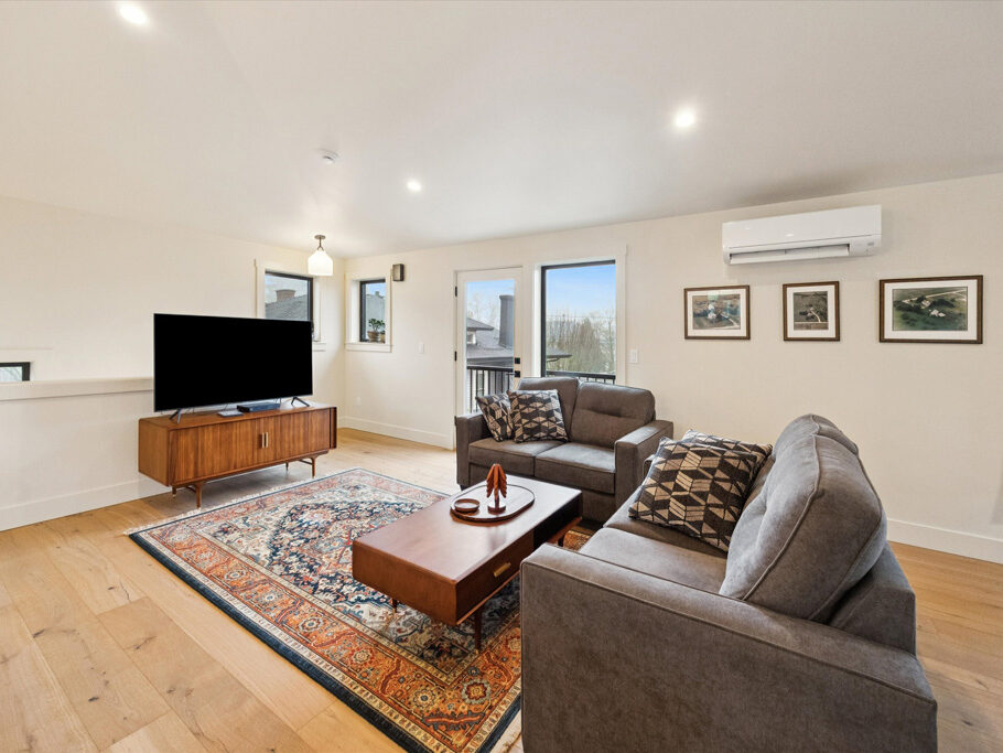 Living area in the 2nd story ADU with garage underneath, contemporary styling
