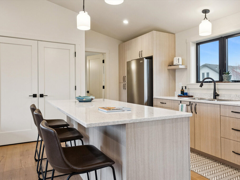 Kitchen island in the 2nd story ADU with garage underneath, contemporary styling