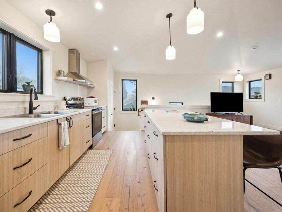 Kitchen island in the 2nd story ADU with garage underneath, contemporary styling
