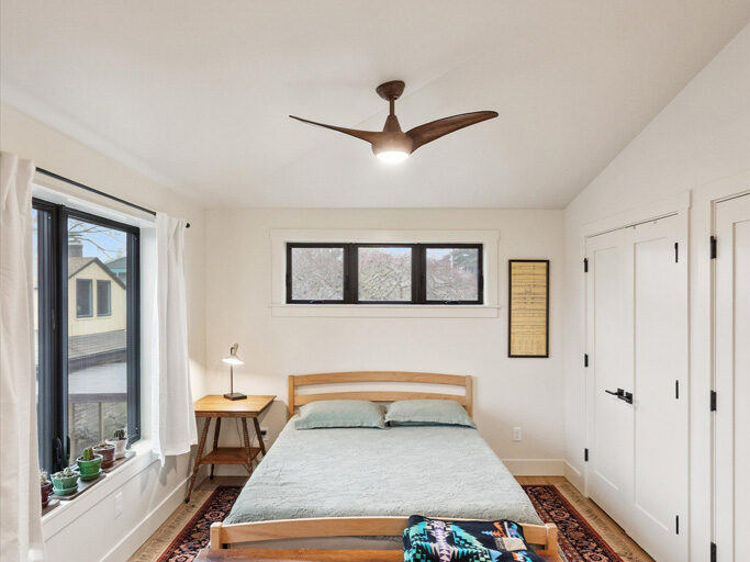Sleeping area in the 2nd story ADU with garage underneath, contemporary styling