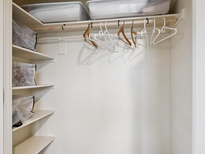 Walk-in closet in open plan 2nd story ADU with garage underneath, contemporary styling