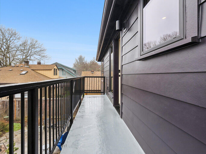 Deck of the 2nd story ADU with garage underneath, contemporary styling