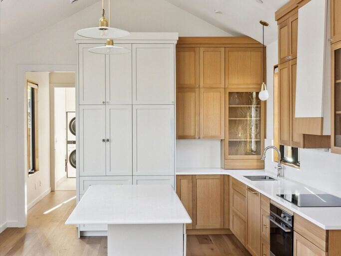 High ceilings and kitchen with island in detached ADU (accessory dwelling unit) on Knight Street in SE Portland, Oregon
